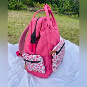 Cabaia pink backpack with switchable pockets